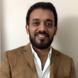 AJIT MUKUNDAN